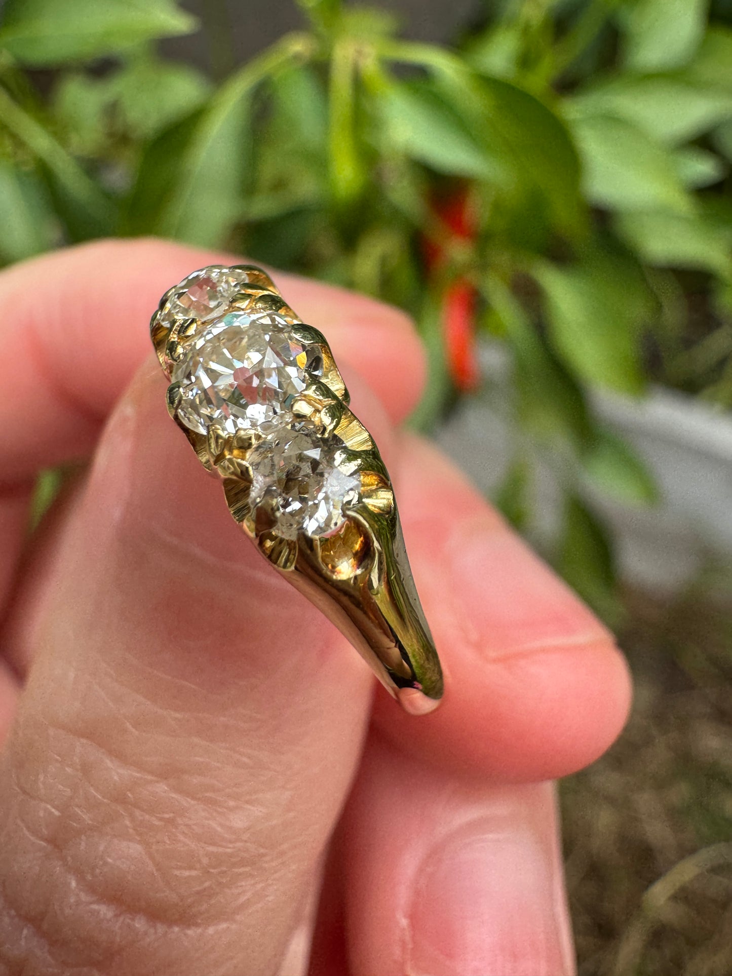 Antique 18ct yellow gold three stone 0.7ct TCW old mine cut diamond ring