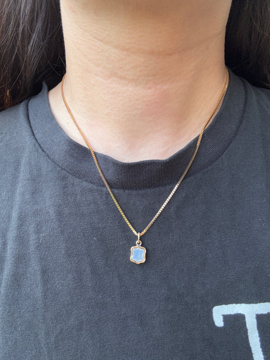 Antique gilt metal heart and Cupid's arrow white chalcedony intaglio pendant