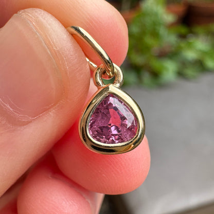 Custom handmade 9ct yellow gold 0.76ct trillion cut natural pink sapphire bezel set pendant