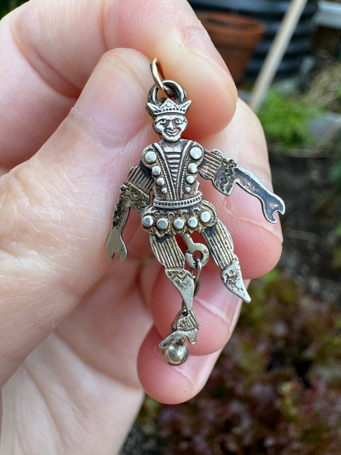 Antique silver and enamel articulated jester charm