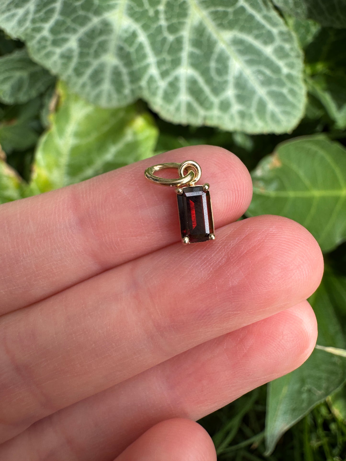 Custom 9ct yellow gold 0.68ct emerald cut garnet pendant