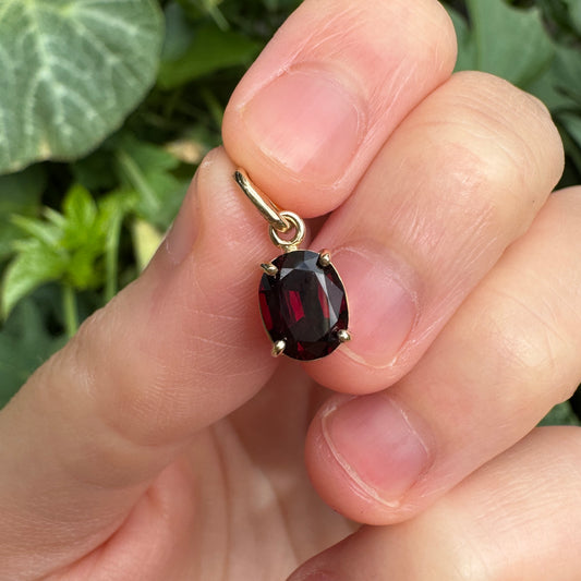 Custom 9ct yellow gold 1.54ct oval cut garnet pendant