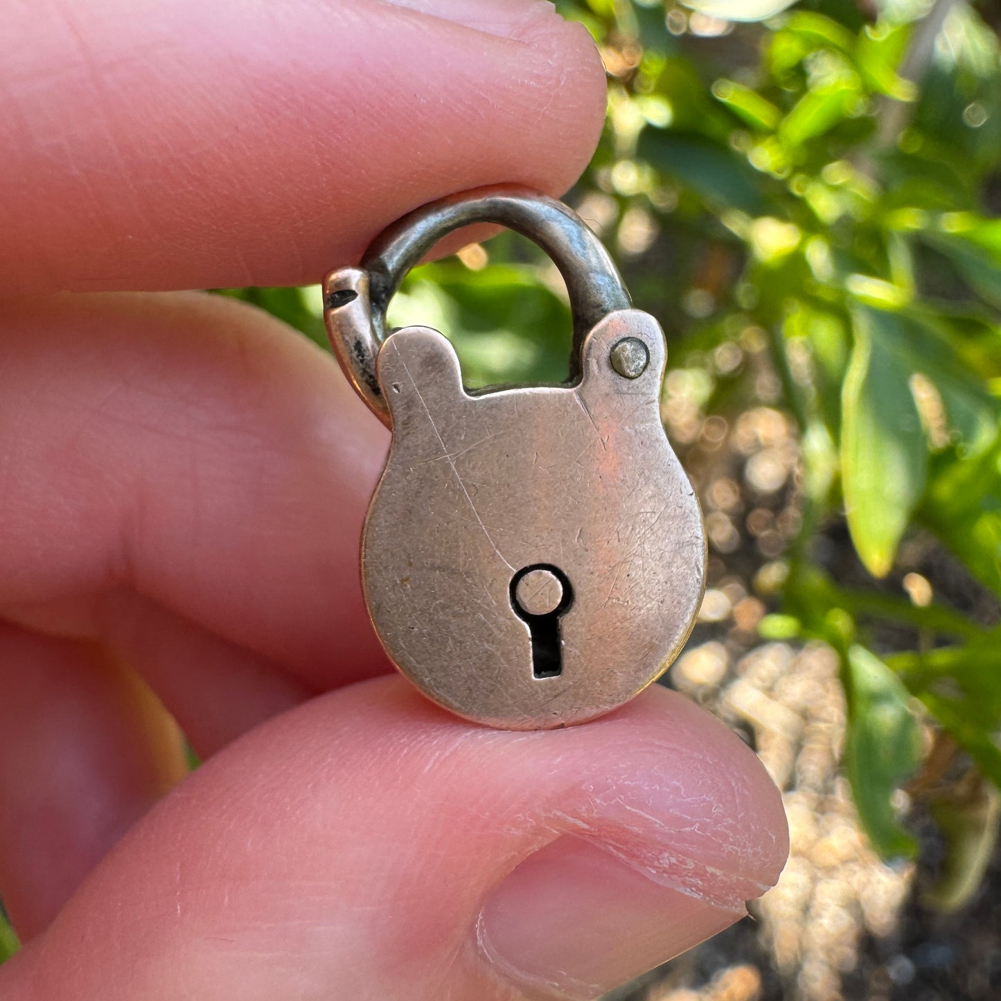 Antique 9ct rose gold padlock pendant