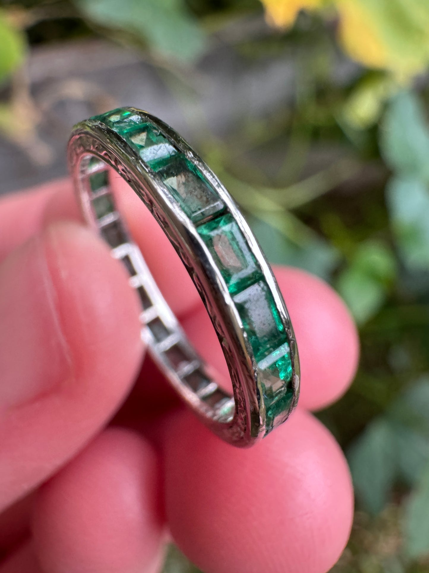 Antique platinum 1.02ct TCW natural emerald engraved eternity ring