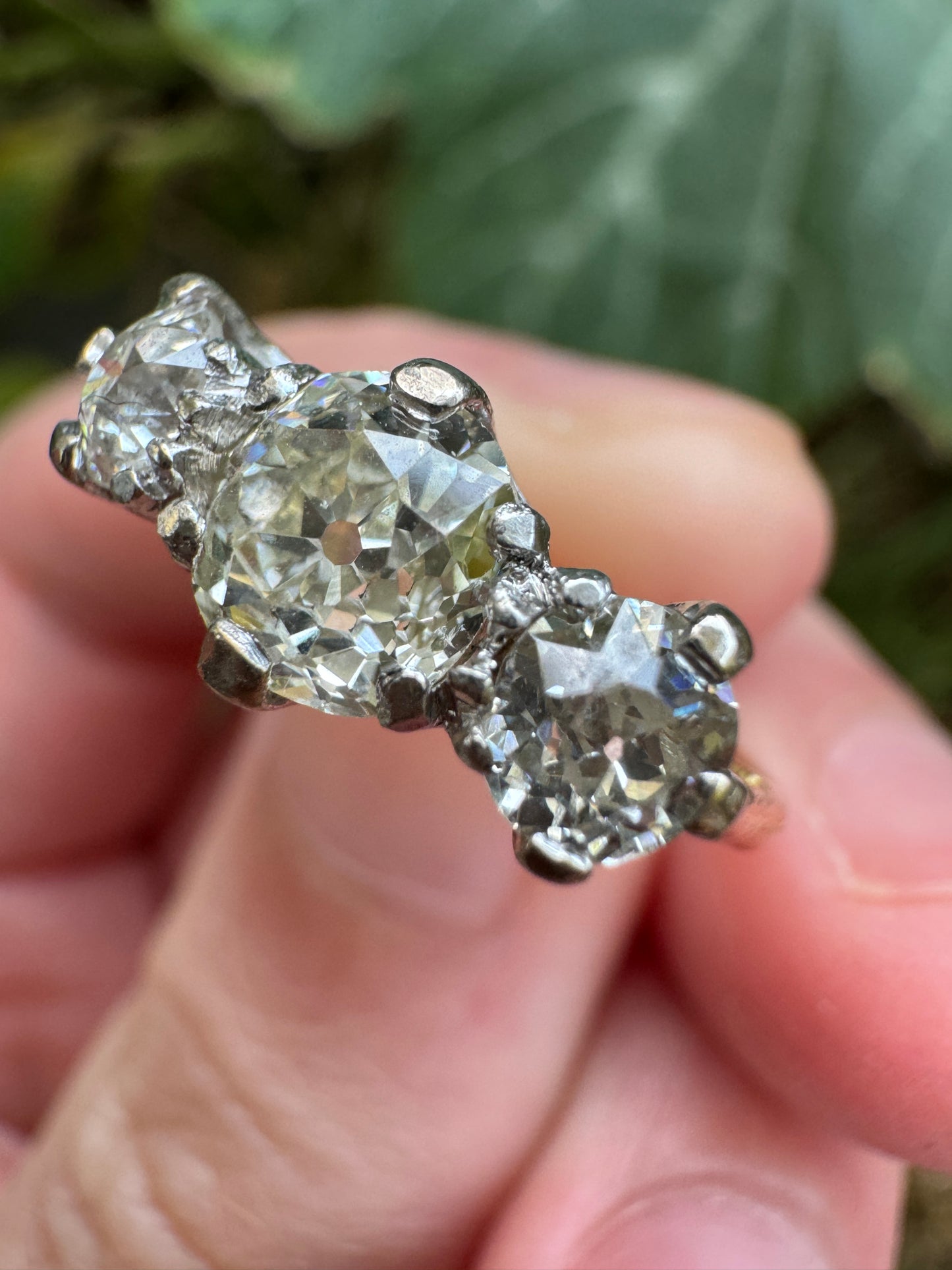 Antique 18ct yellow gold three stone 1.56ct TCW old mine cut diamond ring