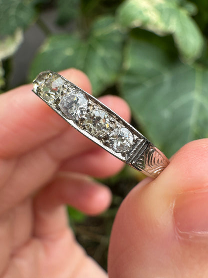 Vintage platinum 0.7ct TCW old mine cut diamond engraved half eternity ring