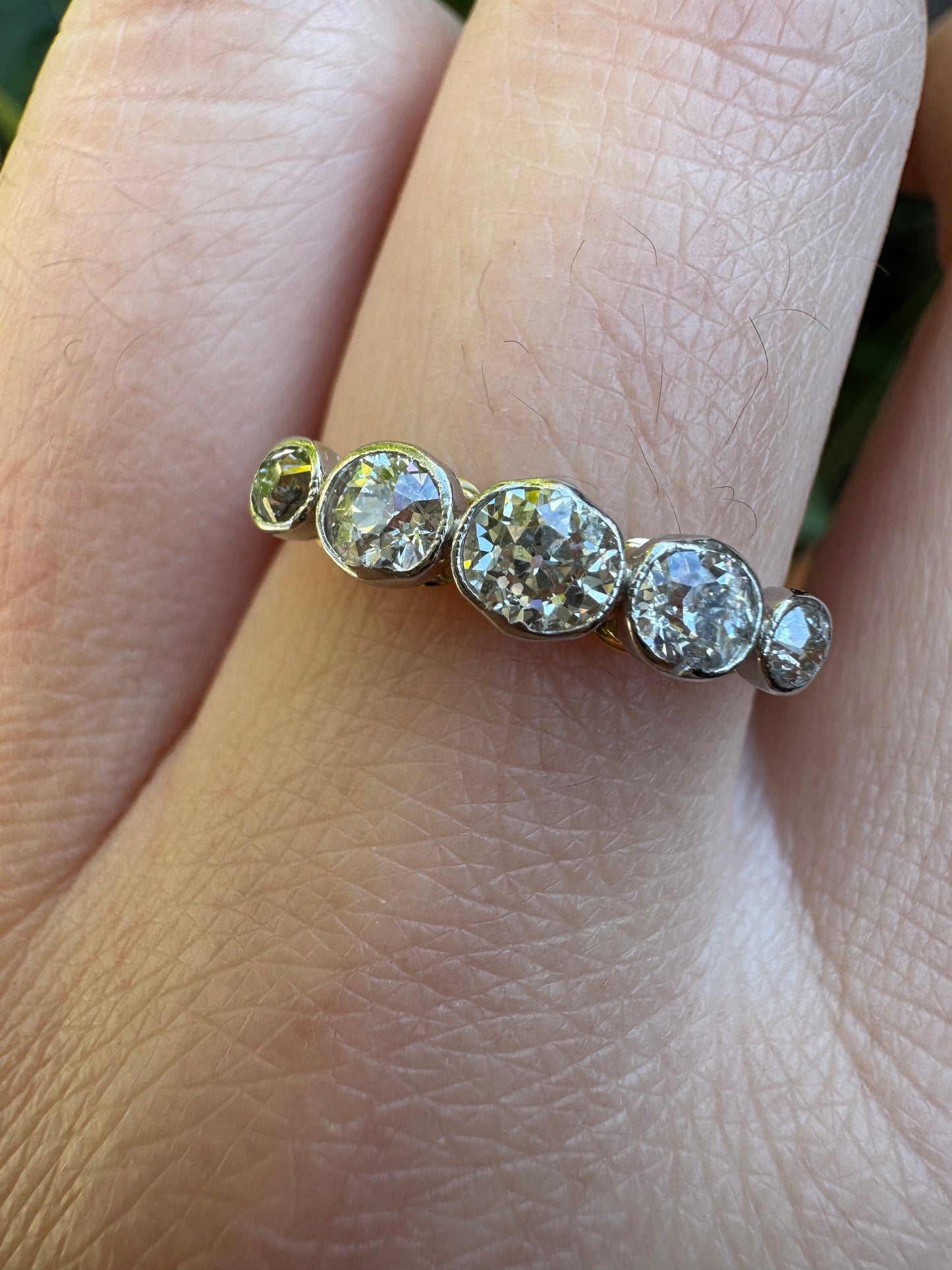 Vintage 18ct yellow gold and platinum five stone 0.69ct TCW old mine cut diamond bezel set ring