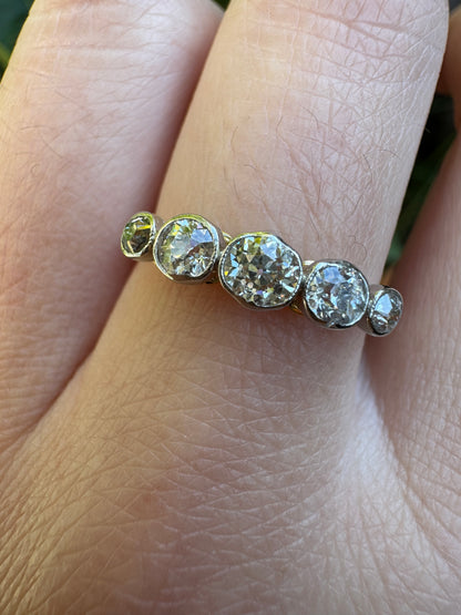Vintage 18ct yellow gold and platinum five stone 0.69ct TCW old mine cut diamond bezel set ring