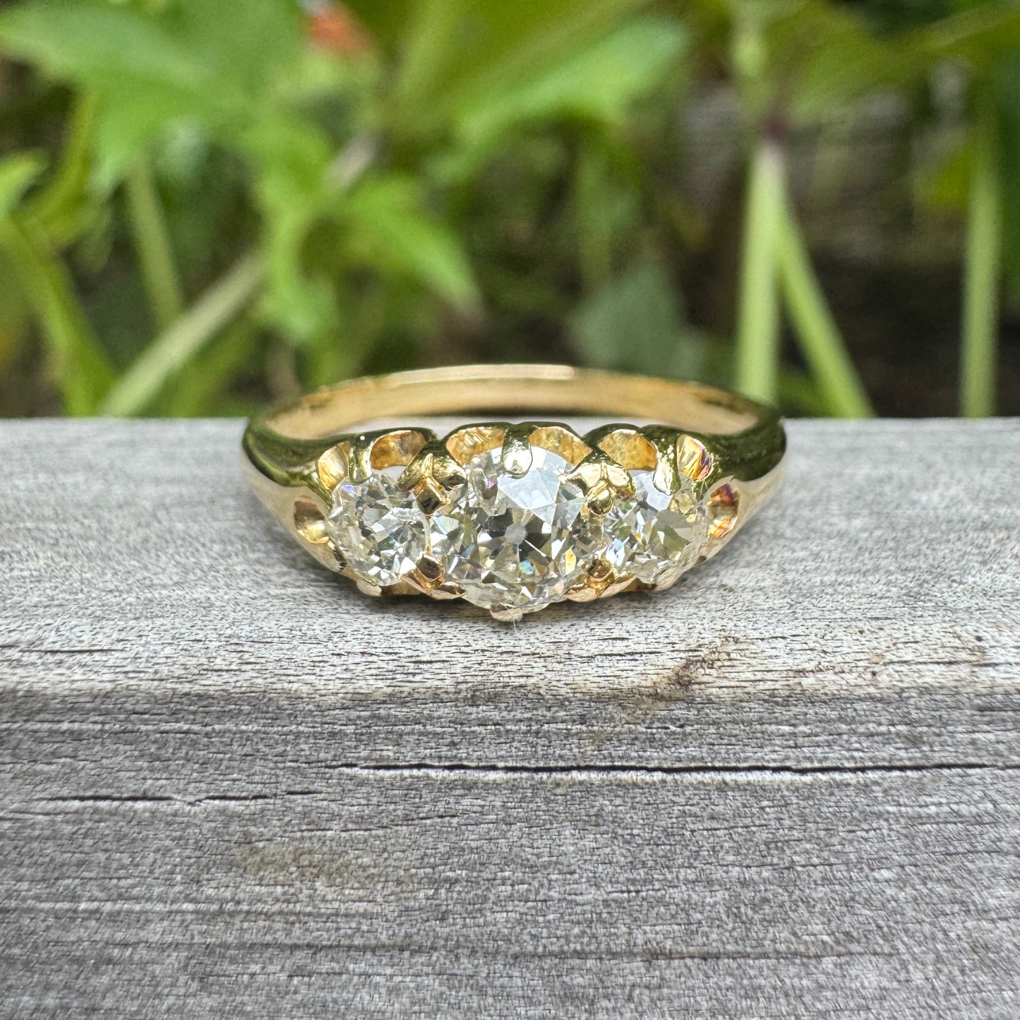 Antique 18ct yellow gold three stone 0.7ct TCW old mine cut diamond ring