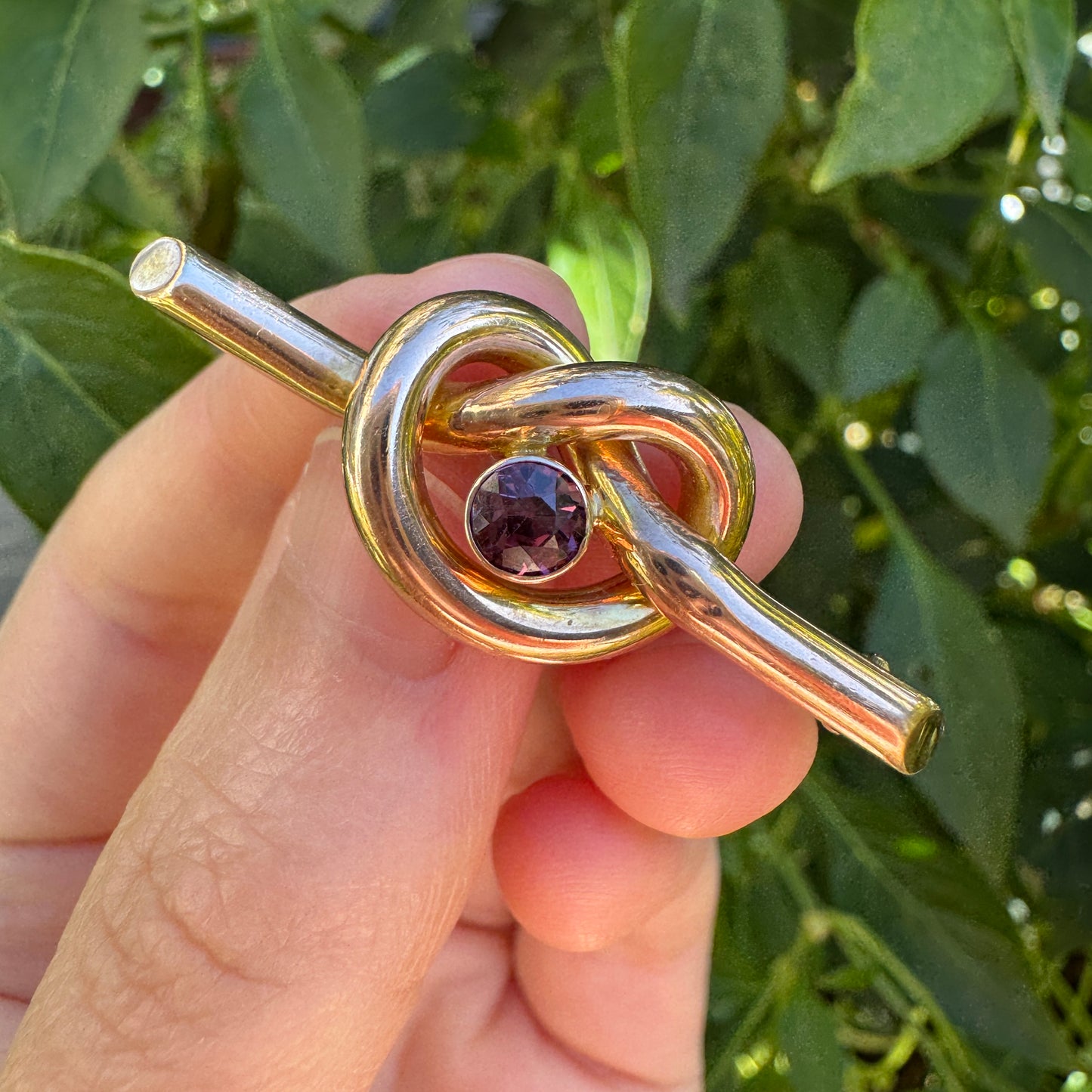 Antique 9ct rosy yellow gold 0.52ct garnet love knot brooch/chain extender