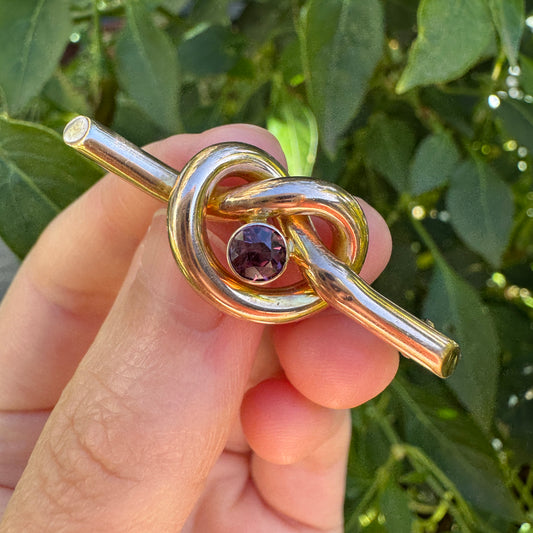 Antique 9ct rosy yellow gold 0.52ct garnet love knot brooch/chain extender