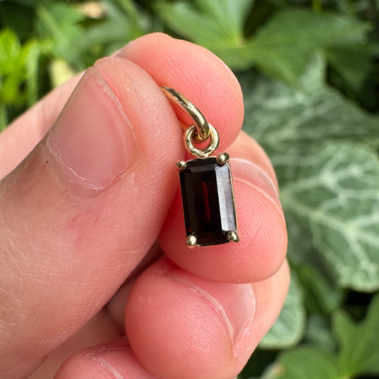 Custom 9ct yellow gold 0.68ct emerald cut garnet pendant