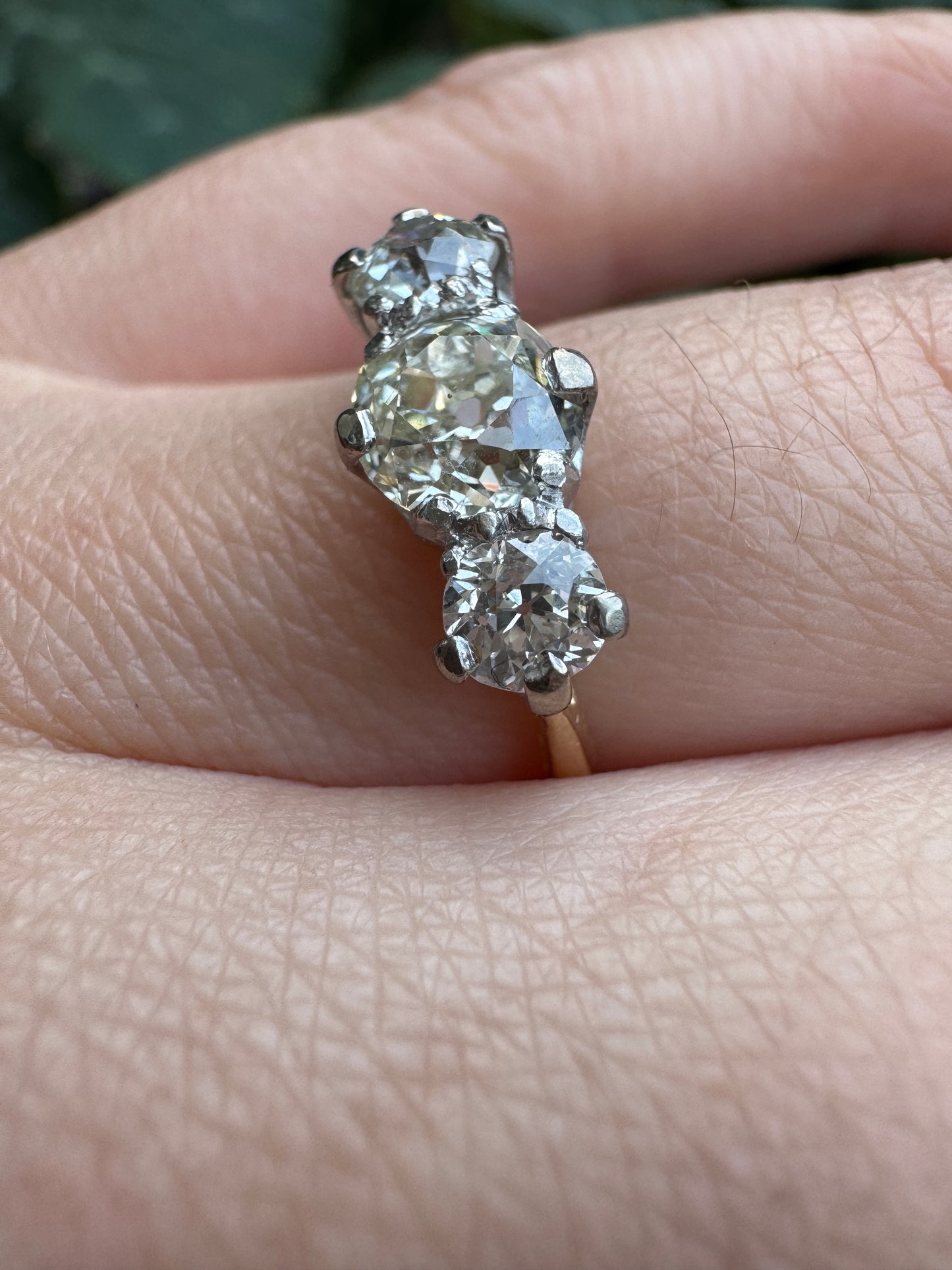 Antique 18ct yellow gold three stone 1.56ct TCW old mine cut diamond ring