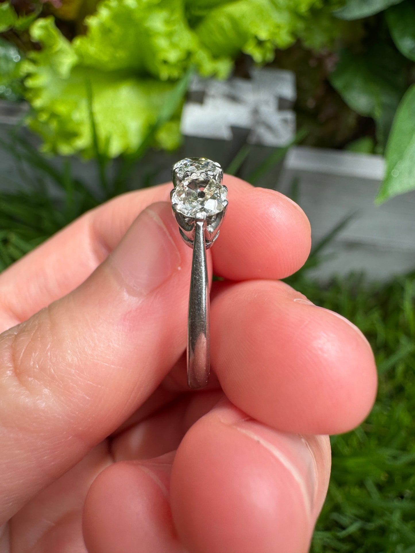 Vintage platinum 1.12ct TCW three stone old mine cut diamond ring