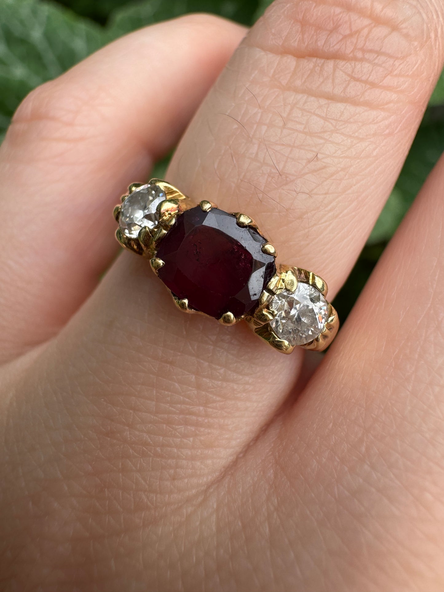 Antique 18ct yellow gold three stone 0.95ct flat cut garnet and 0.45ct TCW old European cut diamond ring
