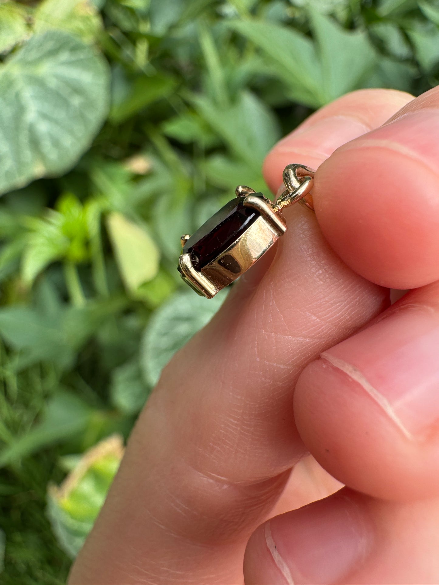 Custom 9ct yellow gold 1.54ct oval cut garnet pendant