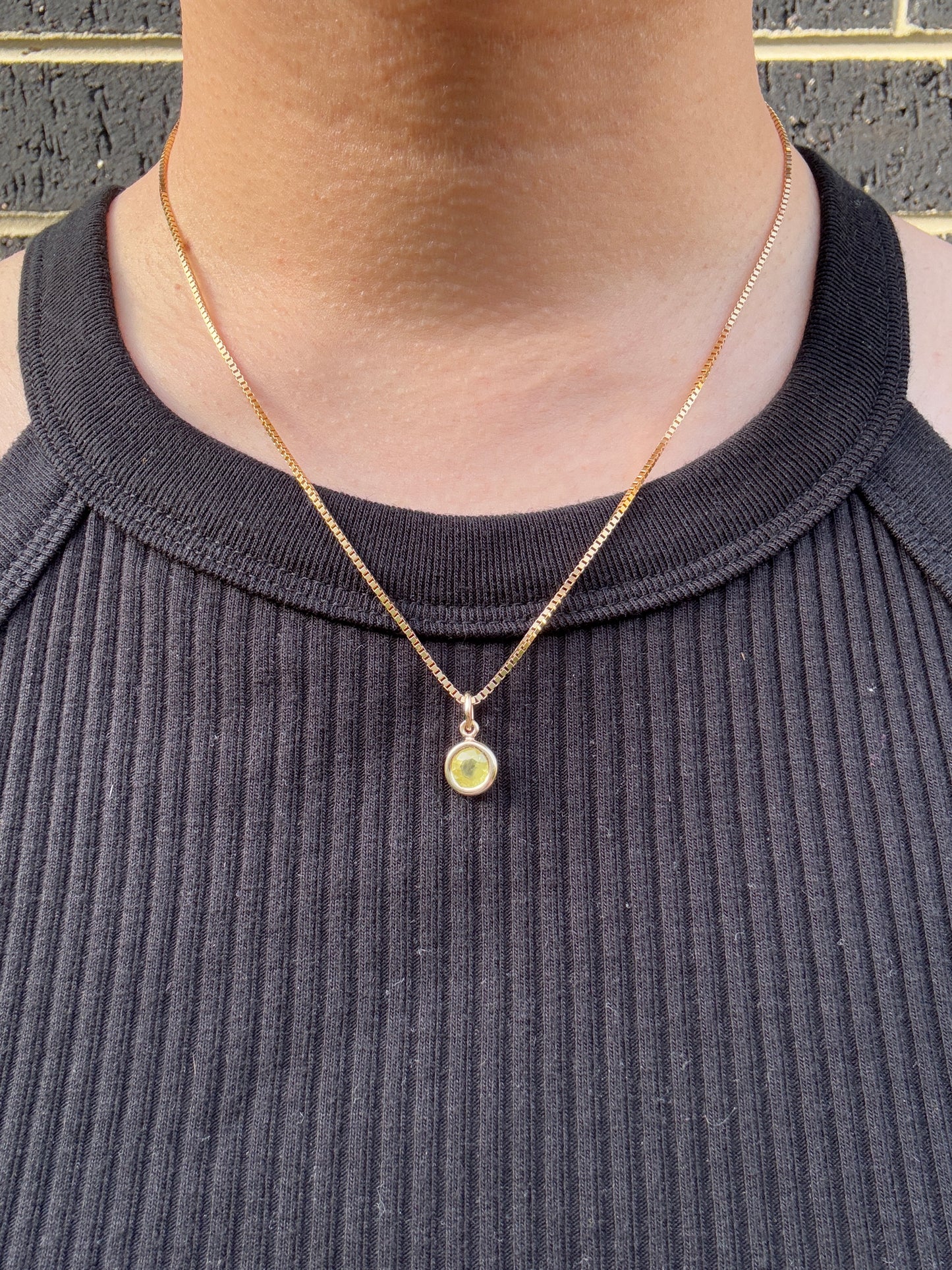 Custom 9ct yellow gold 1.15ct round cut yellow sapphire bezel set pendant