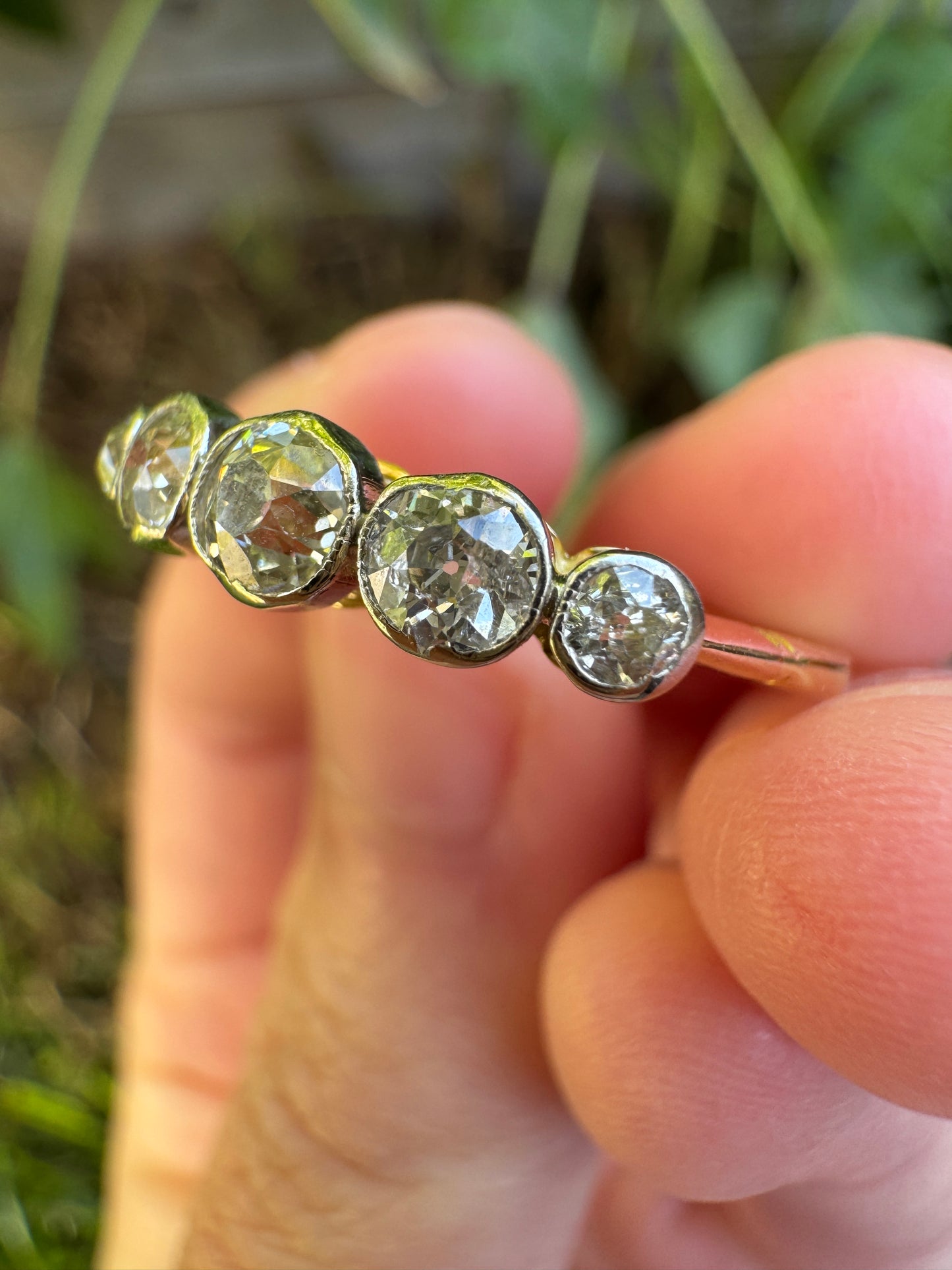 Vintage 18ct yellow gold and platinum five stone 0.69ct TCW old mine cut diamond bezel set ring