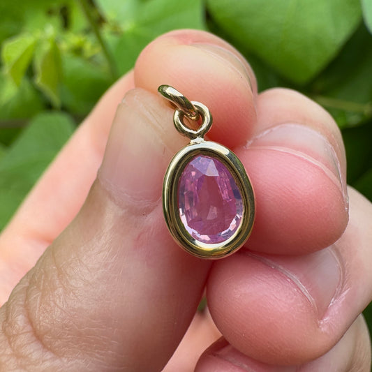 Custom 9ct yellow gold 0.8ct pear cut pink sapphire bezel set pendant