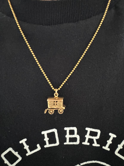 Vintage 9ct yellow gold opening caravan charm