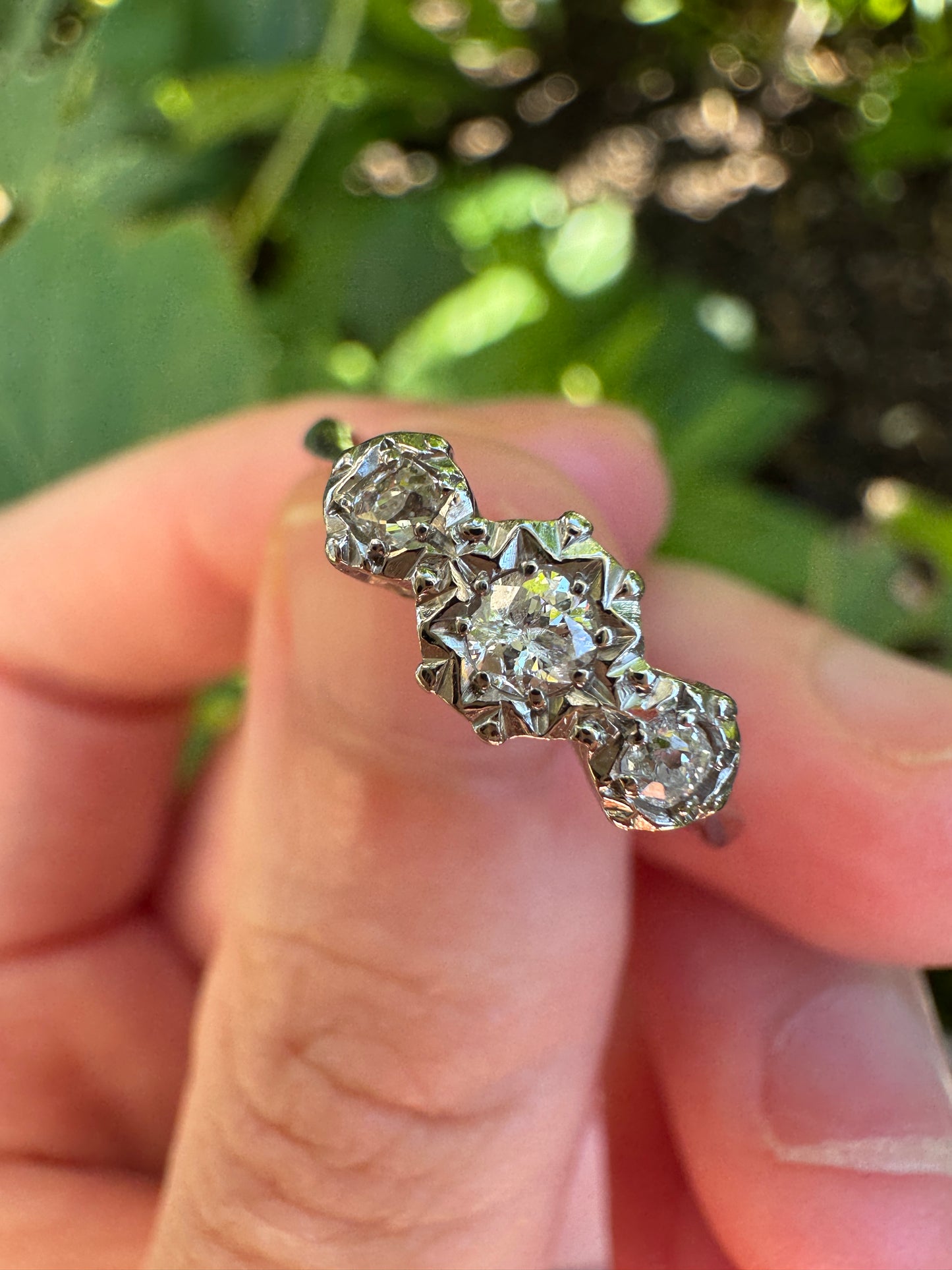Vintage 18ct white gold and platinum three stone 0.16ct TCW old mine cut and old European cut diamond ring
