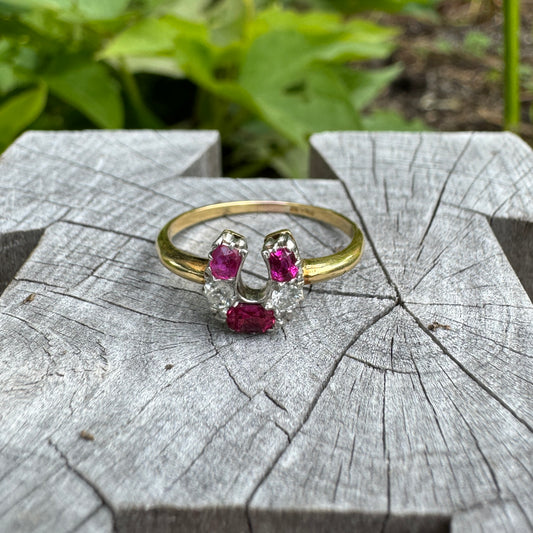 Vintage 18ct yellow gold ruby and diamond horseshoe ring