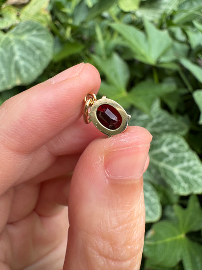 Custom 9ct yellow gold 1.54ct oval cut garnet pendant