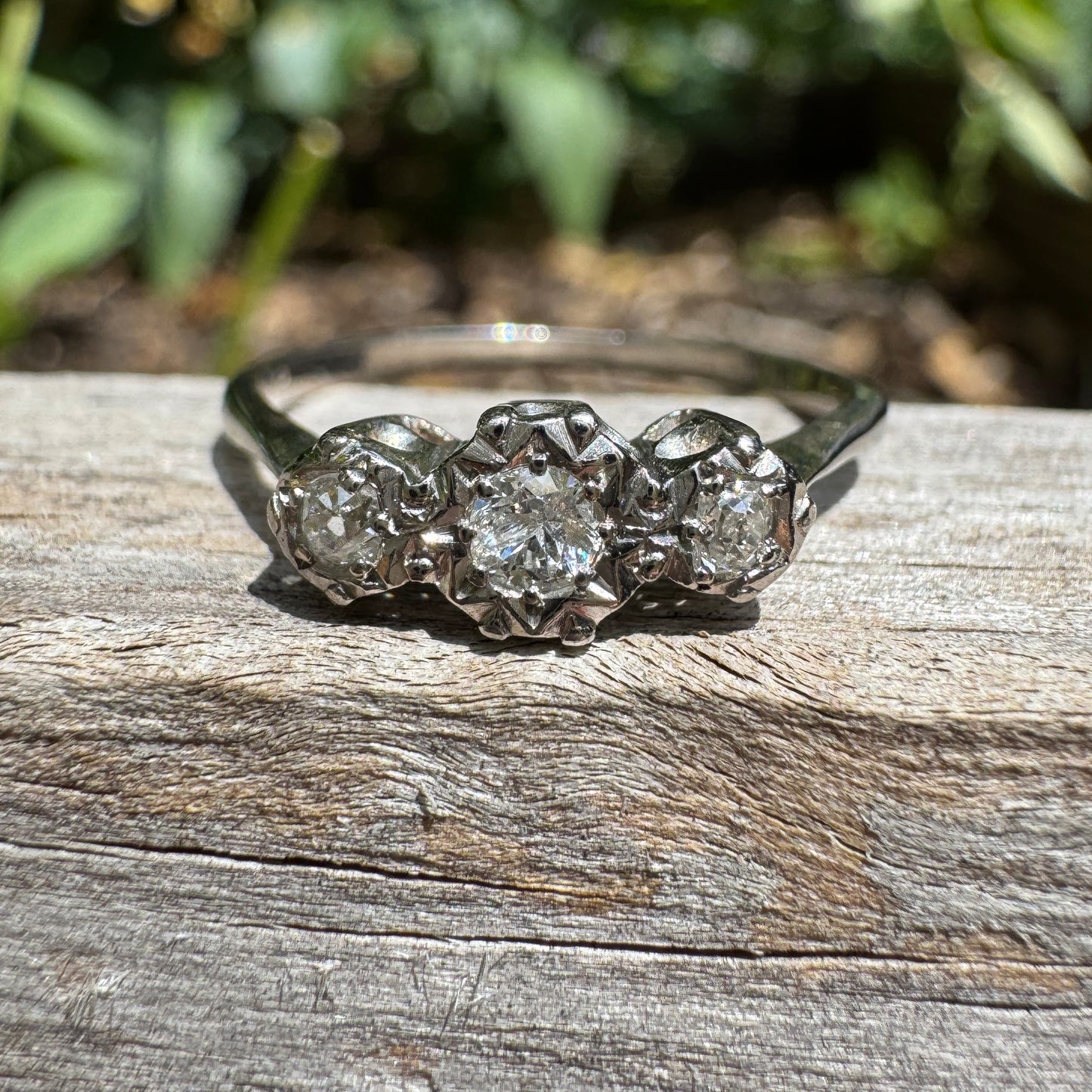 Vintage 18ct white gold and platinum three stone 0.16ct TCW old mine cut and old European cut diamond ring