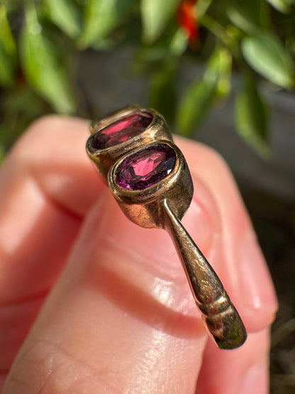 Antique 9ct rose gold three stone 0.7ct TCW garnet bezel set ring