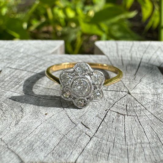 Vintage 18ct yellow gold and platinum 0.55ct TCW old mine cut and single cut diamond daisy ring