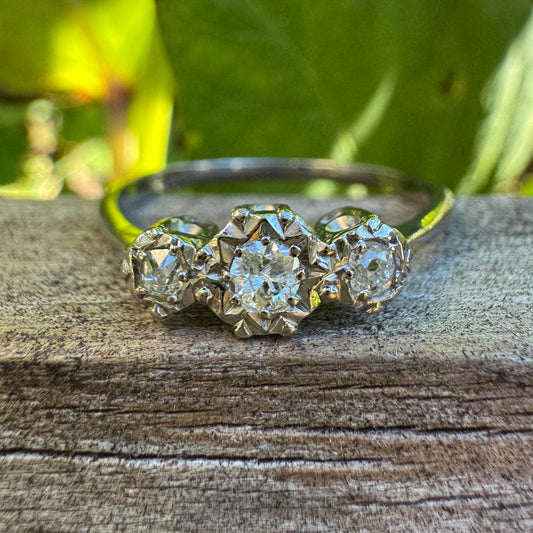Vintage 18ct white gold and platinum three stone 0.16ct TCW old mine cut and old European cut diamond ring