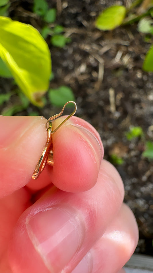 Vintage 9ct yellow gold garnet knot pendant
