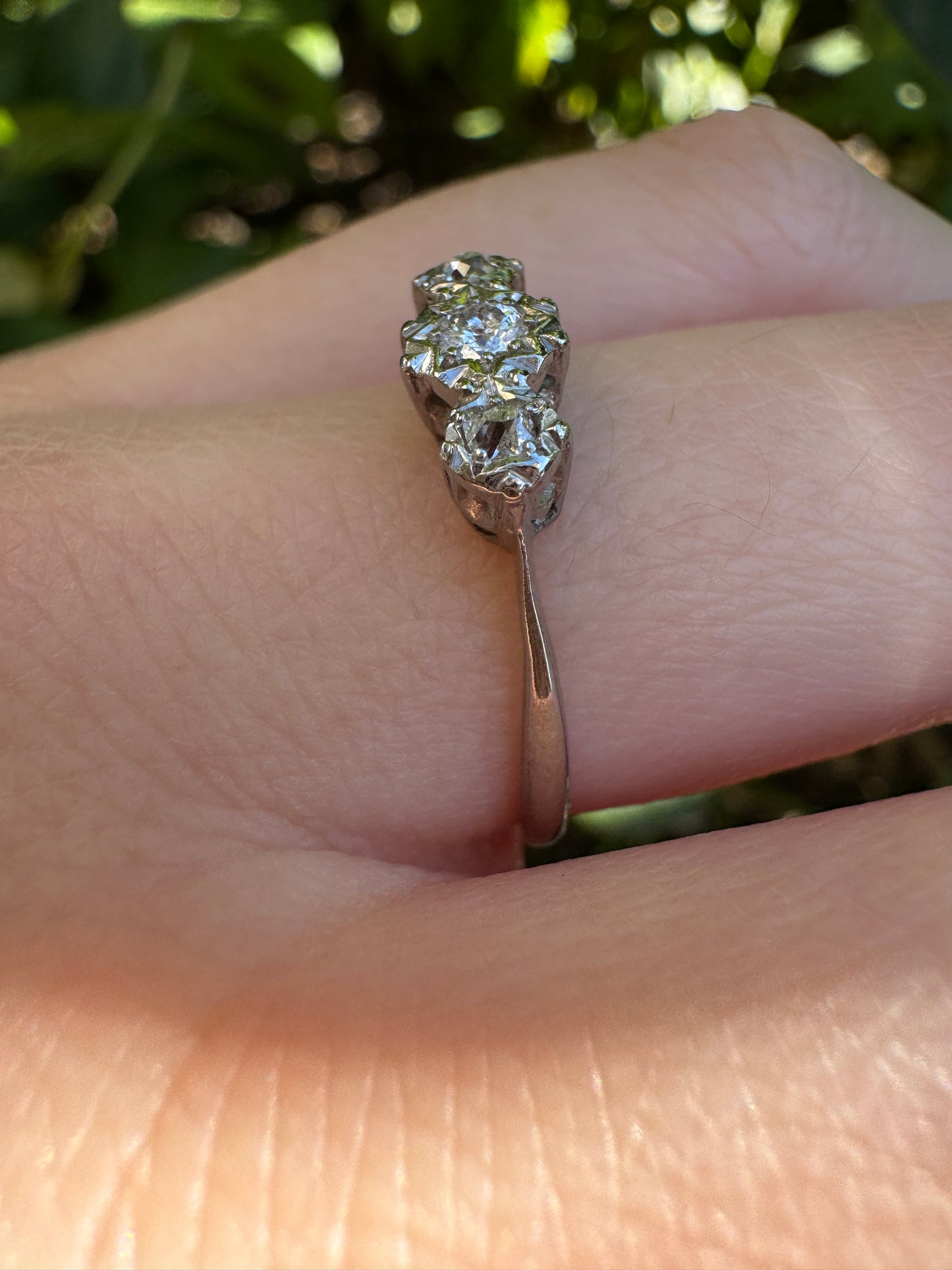 Vintage 18ct white gold and platinum three stone 0.16ct TCW old mine cut and old European cut diamond ring