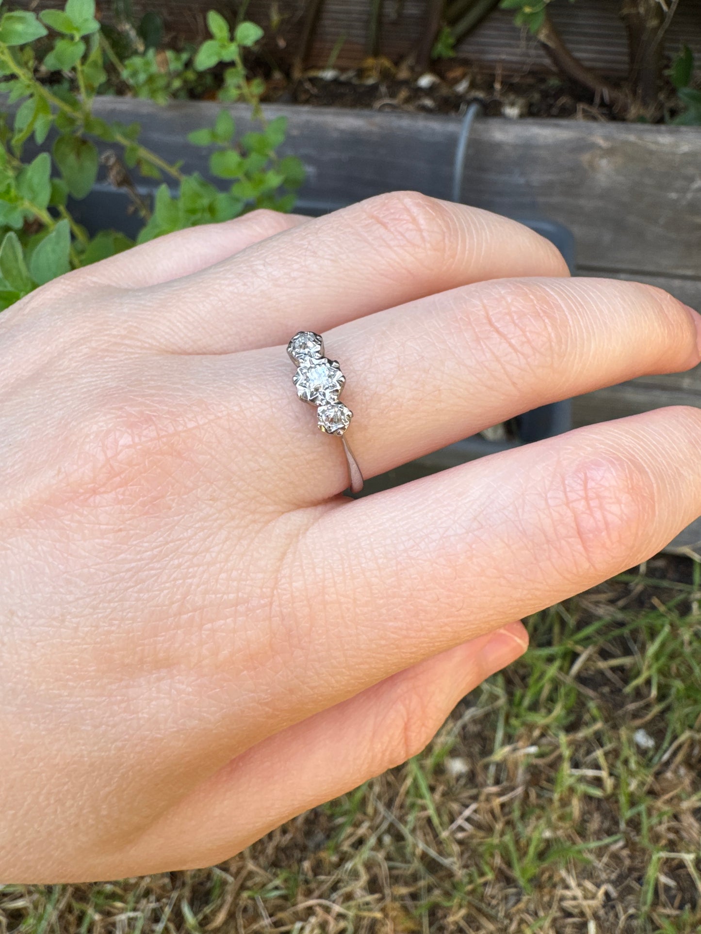 Vintage 18ct white gold and platinum three stone 0.16ct TCW old mine cut and old European cut diamond ring