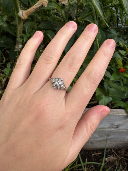 Antique platinum 0.17ct old mine cut and 0.12ct TCW old single cut diamond ring with accent ruby cabochons