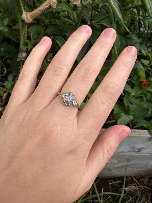 Antique platinum 0.17ct old mine cut and 0.12ct TCW old single cut diamond ring with accent ruby cabochons