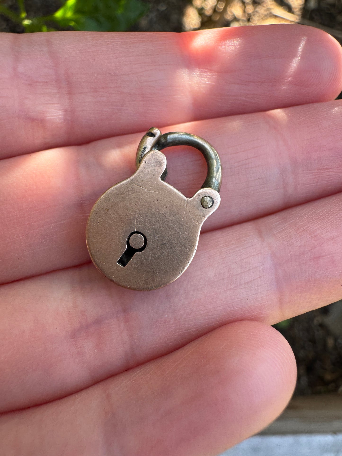 Antique 9ct rose gold padlock pendant