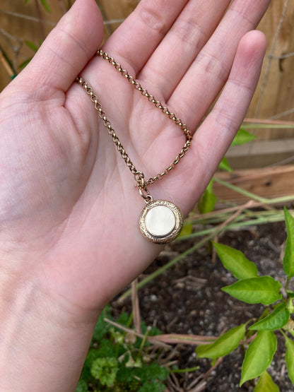 Vintage 9ct gold split pearl and blue enamel pendant