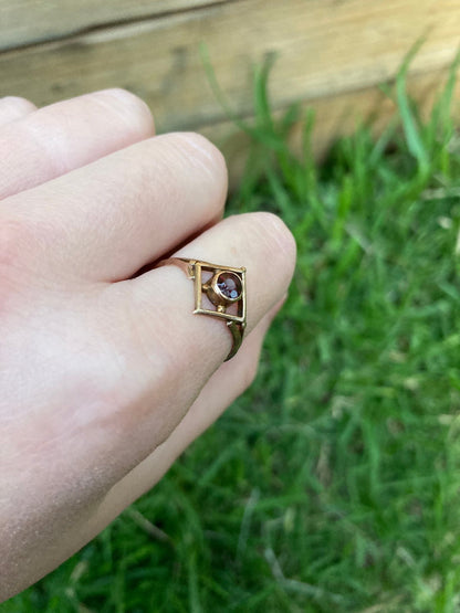 Antique 9ct rose gold plaque garnet ring