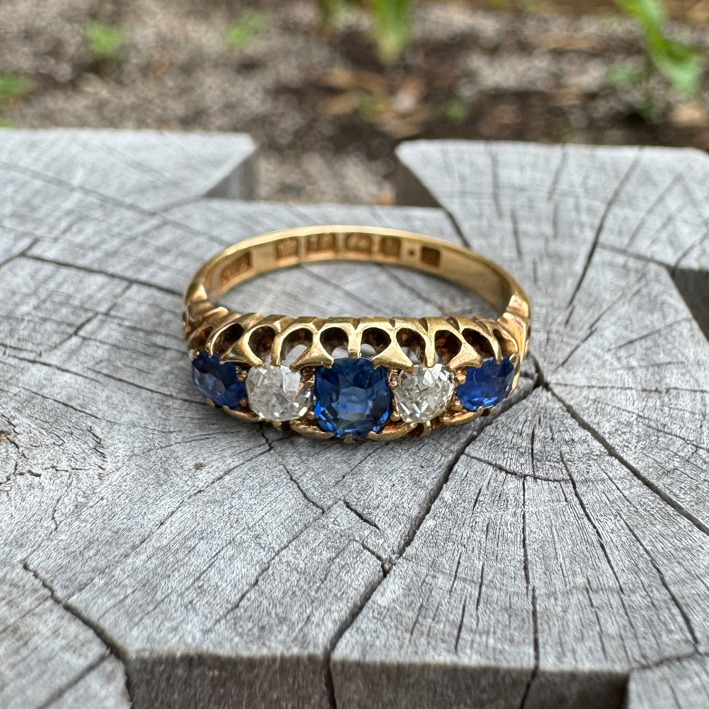 Antique 18ct yellow gold five stone 0.5ct TCW old cut natural sapphire and 0.38ct TCW old mine cut diamond ring