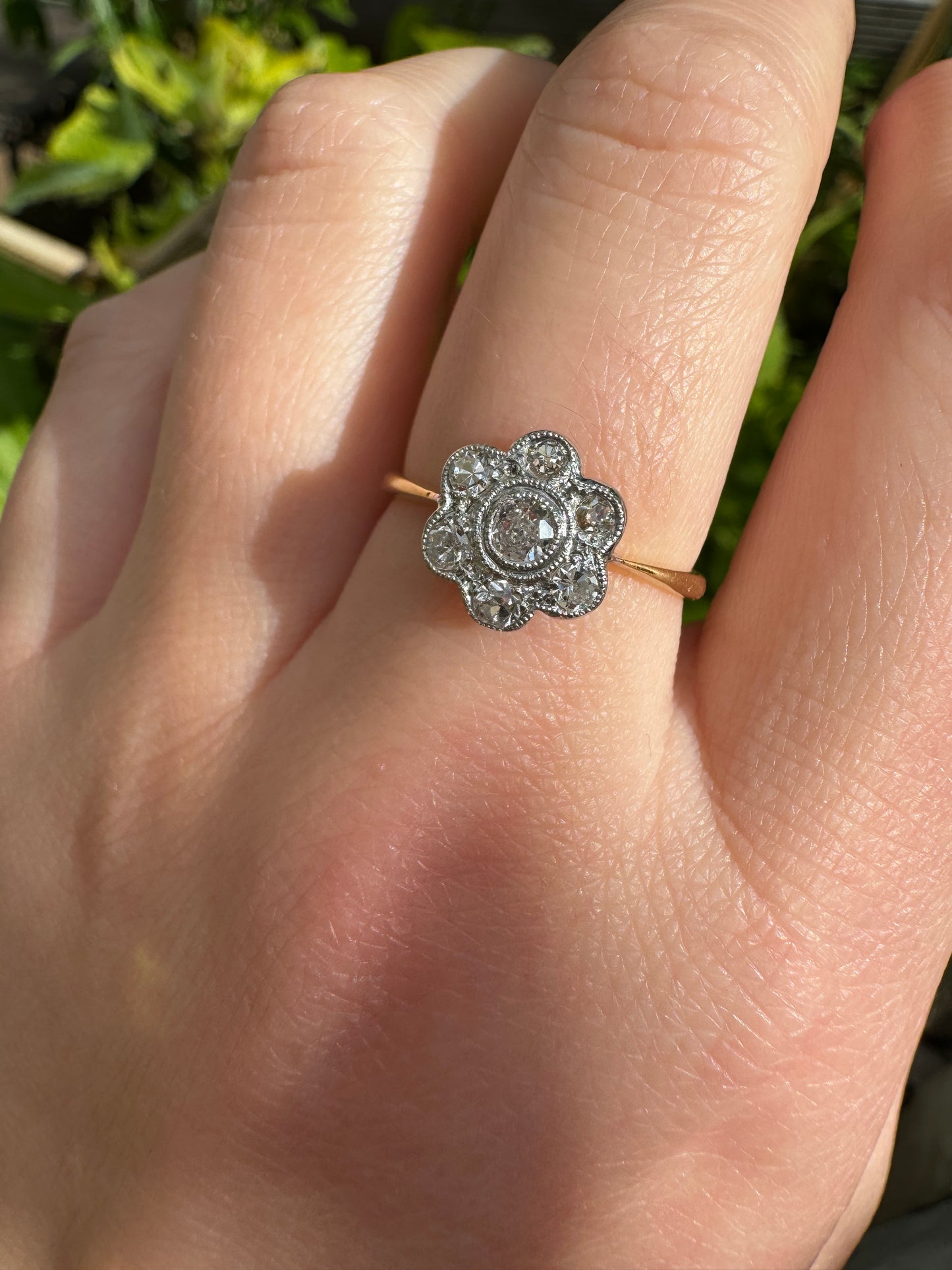 Vintage 18ct yellow gold and platinum 0.55ct TCW old mine cut and single cut diamond daisy ring
