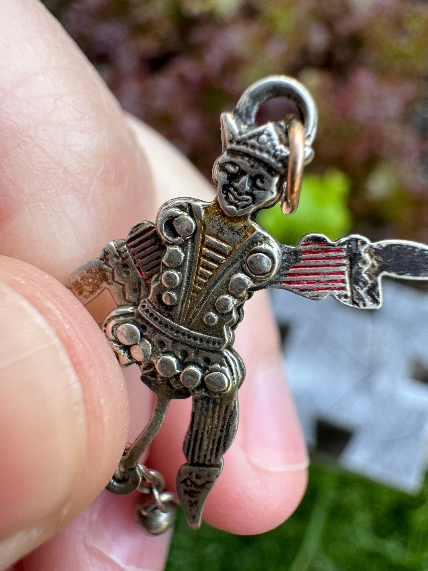 Antique silver and enamel articulated jester charm (no movement)