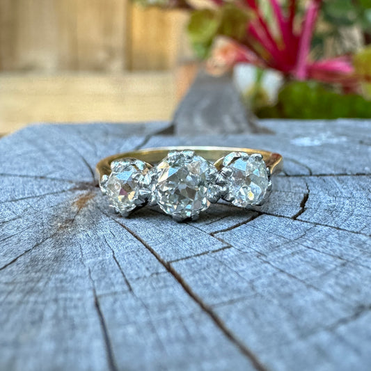 Vintage 18ct yellow gold and platinum 1.2ct TCW three stone old mine cut diamond ring