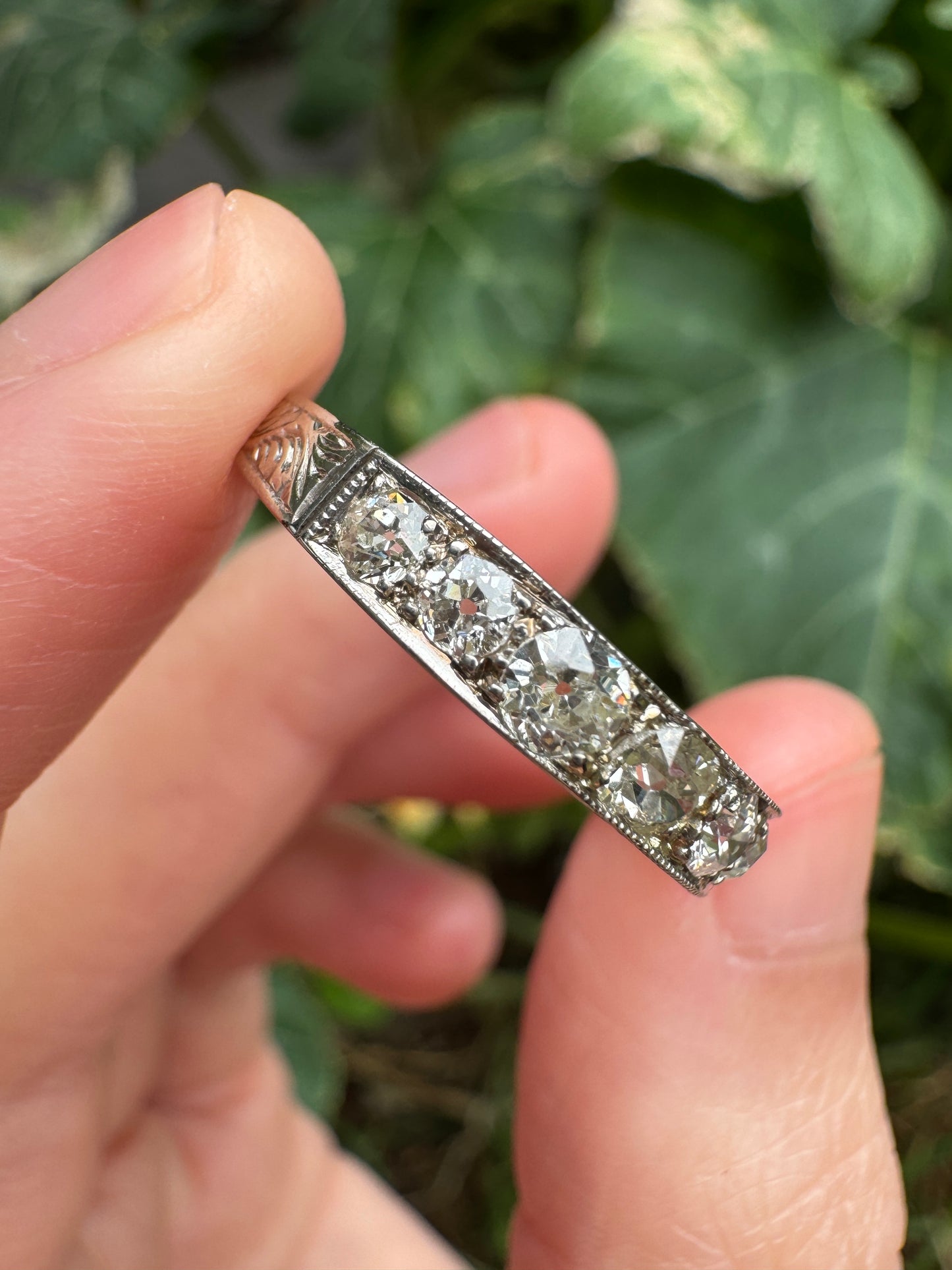 Vintage platinum 0.7ct TCW old mine cut diamond engraved half eternity ring