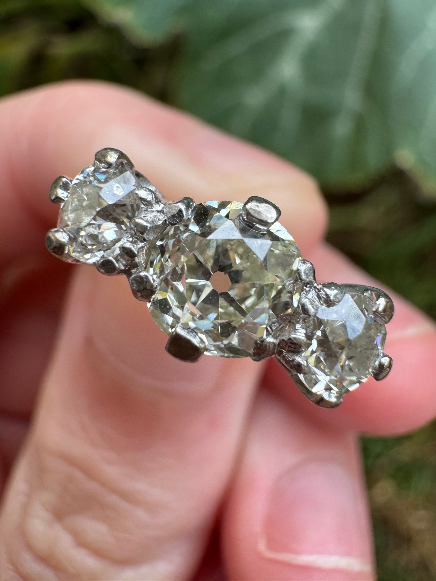 Antique 18ct yellow gold three stone 1.56ct TCW old mine cut diamond ring