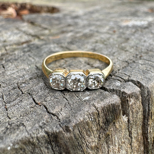 Vintage 18ct yellow gold three stone 0.6ct TCW old mine cut diamond bezel set ring