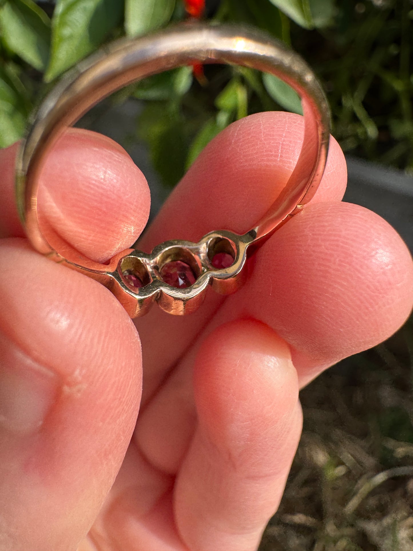 Antique 9ct rose gold three stone 0.7ct TCW garnet bezel set ring