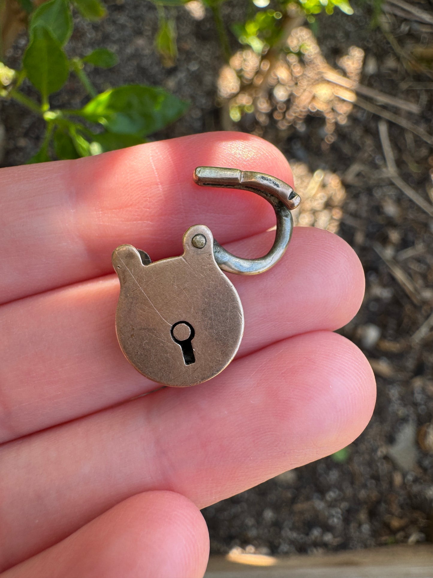 Antique 9ct rose gold padlock pendant