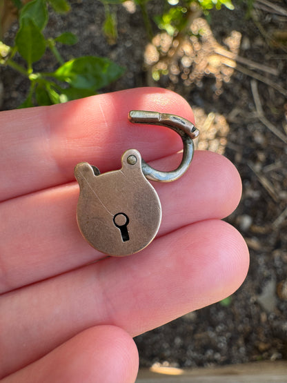 Antique 9ct rose gold padlock pendant