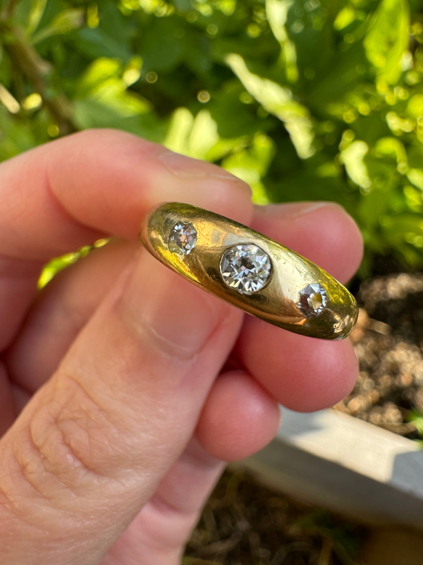 Vintage 18ct yellow gold 0.2ct TCW three stone old mine cut and single cut diamond gypsy ring